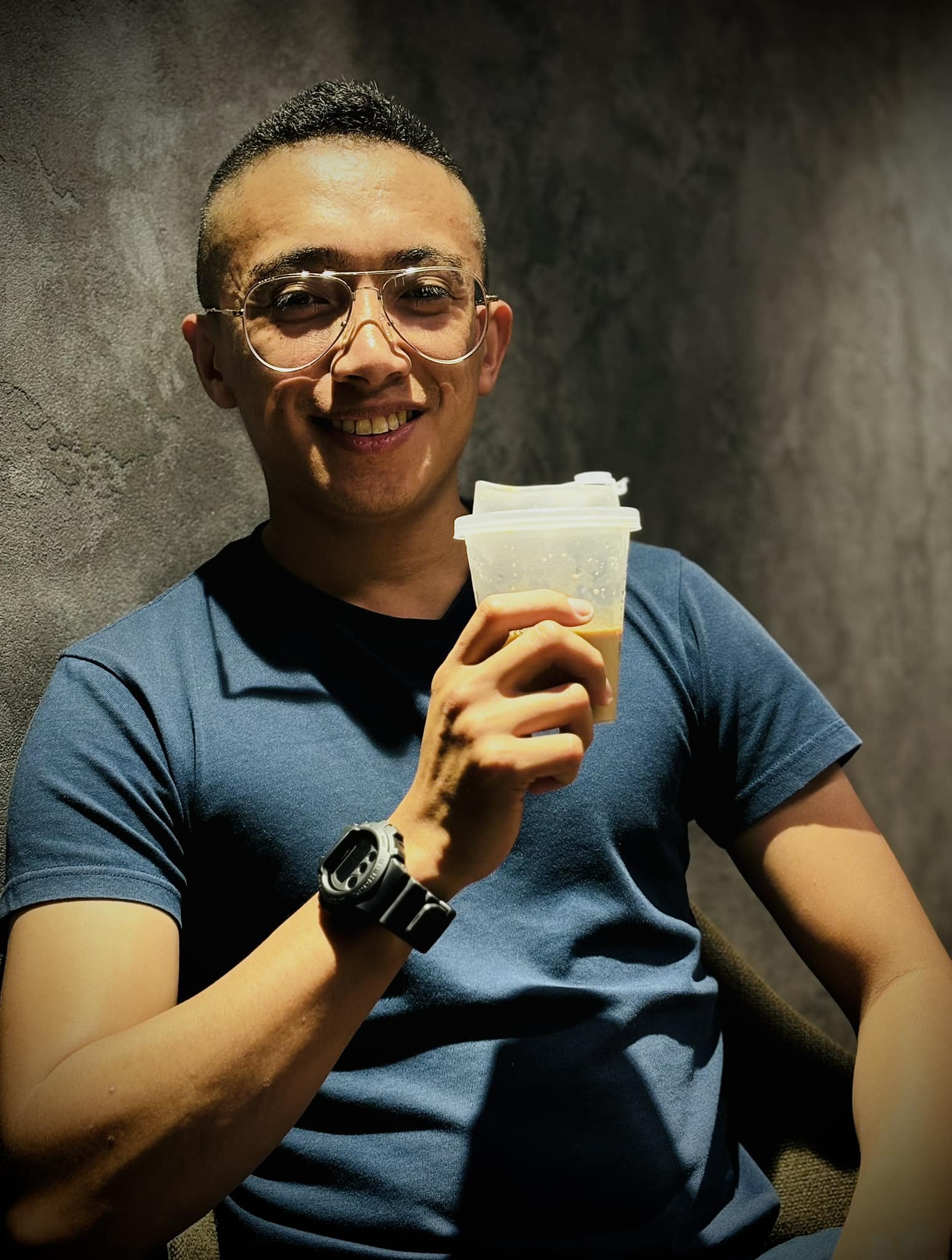 Mr. Tuk Holding Coffee